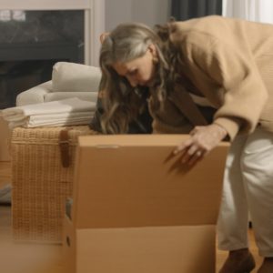 woman decluttering home